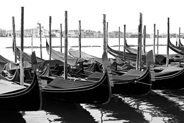 istock gondolas typical boat of Venice in Italy moored with black and white effect 1457458762
