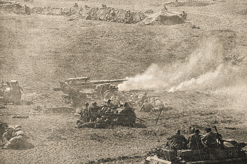 WWII German Artillery Soldiers shooting 88mm gun on D Day.