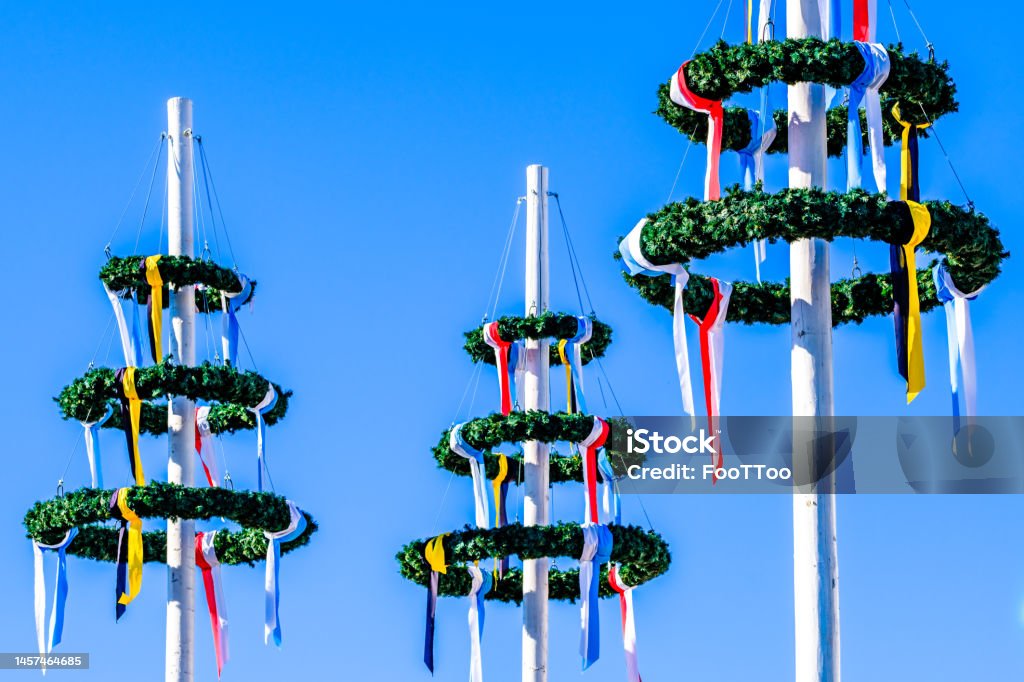typical bavarian maypole with wreath typical bavarian maypole with wreath - germany Maypole Stock Photo