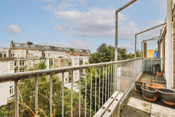 istock Narrow balcony with chair and door 1457464726