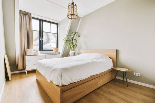 istock Light bedroom with wooden wardrobe 1457465004