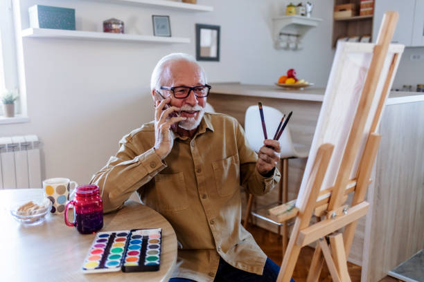 istock Senior craftsperson talking on the phone. 1457469278