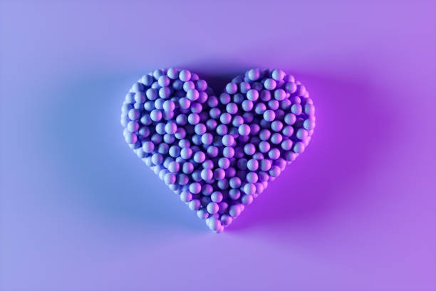 istock Heart Shape on Purple Background Valentine's Day Concept Neon Lighting 1457471566