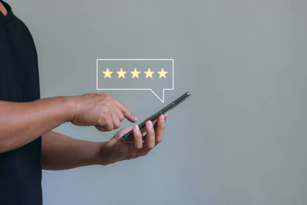 istock Customer review satisfaction feedback survey concept, User give rating to service experience on online application, Customer can evaluate quality of service leading to reputation ranking of business. 1457477082