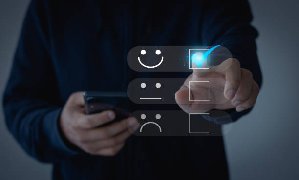 istock Customer service and Satisfaction concept, Business people touch the virtual screen on the happy Smile face icon to give satisfaction in service. rating very impressed. 1457477094