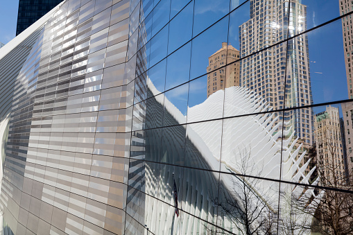 Mirror reflection of buildings in Manhattan, New York, United States.