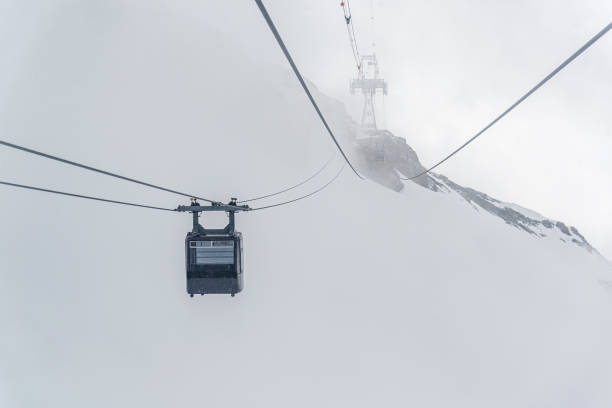 istock Cable car on fog 1457487704