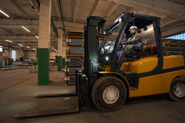 istock Worker sitting in car and preparing to load materials 1457496044