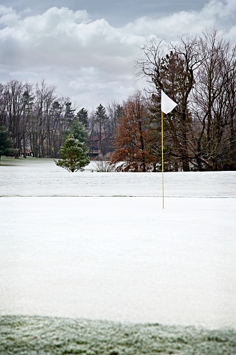 Quiet golf course In winter after a light snow.