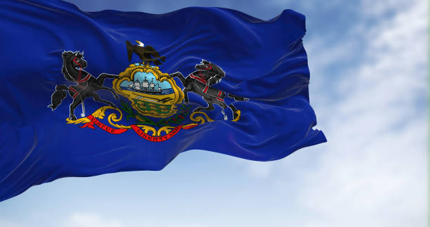 istock Pennsylvania state flag waving in the wind on a clear day. 1457499257