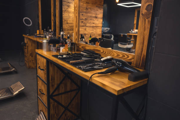 istock Close up of barbers tools on the wooden surface 1457501264