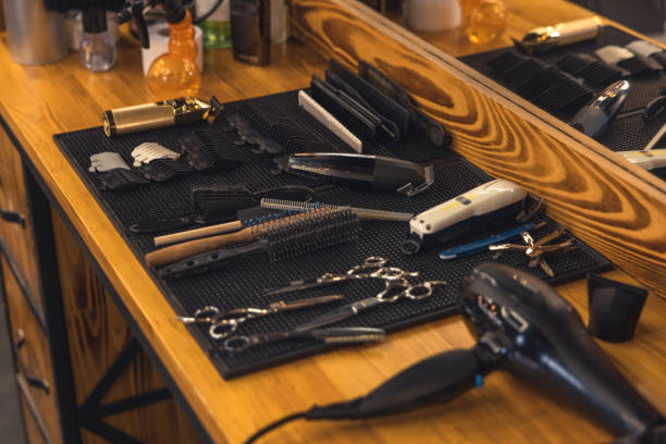 istock Close up of barbers tools on the wooden surface 1457501277