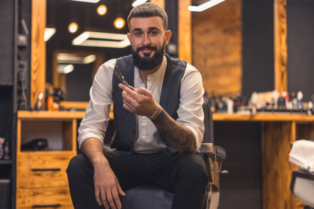 istock Handsome stylish barber at this working place 1457501314