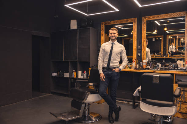 istock Good-looking confident businessman in a barbershop 1457501934