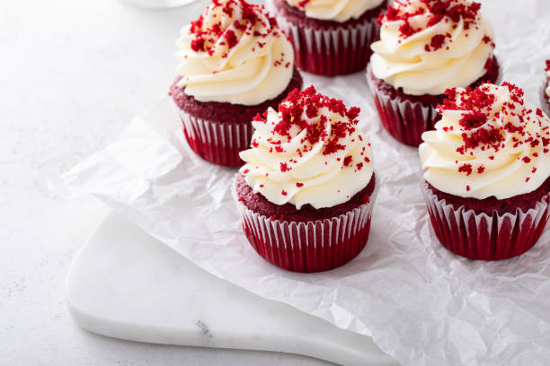 istock Red velvet cupcakes on a marble board 1457502394