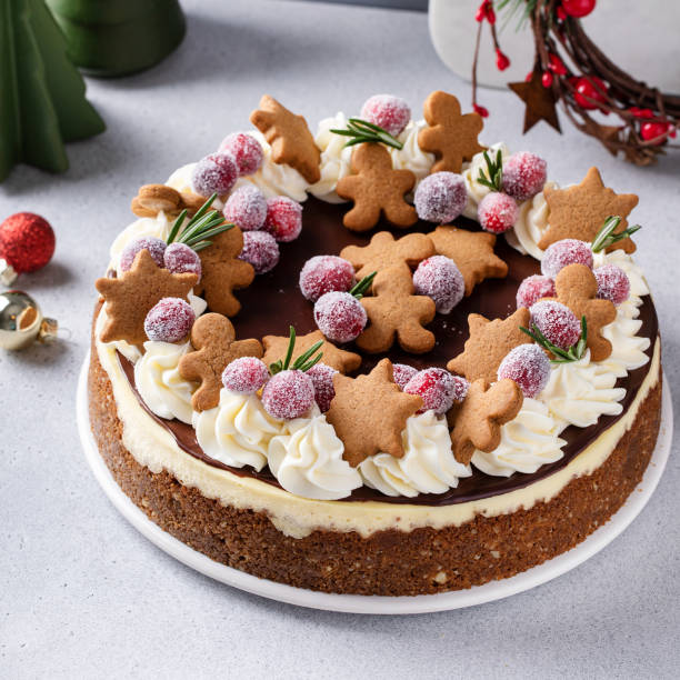 istock Christmas cake decorated with gingerbread cookies and sugared cranberry 1457502496