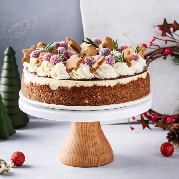istock Christmas cake decorated with gingerbread cookies and sugared cranberry 1457502497