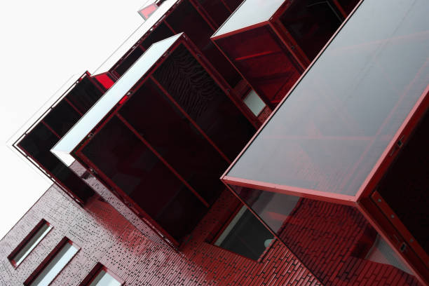 istock Low angle view of modern building against sky 1457505098