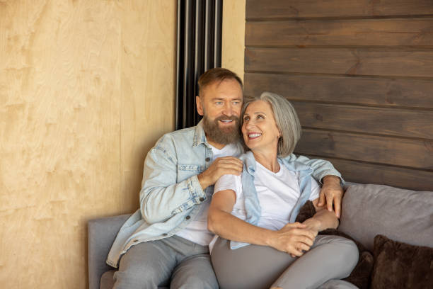 istock Mature couple peacefully spending time at home together 1457507801