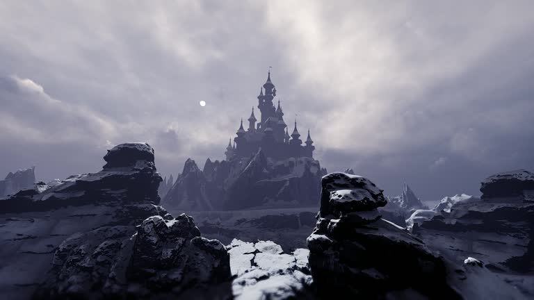 Dark ancient castle with towers is located on the top of the mountain