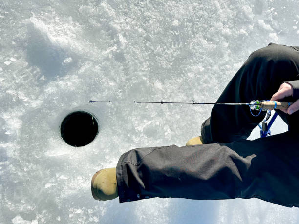 istock Ice fishing 1457509513