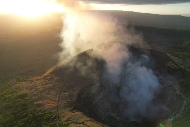 Masaya national park theme Masaya national park theme. Active volcano crater with smoke emission background masaya volcano stock pictures, royalty-free photos & images