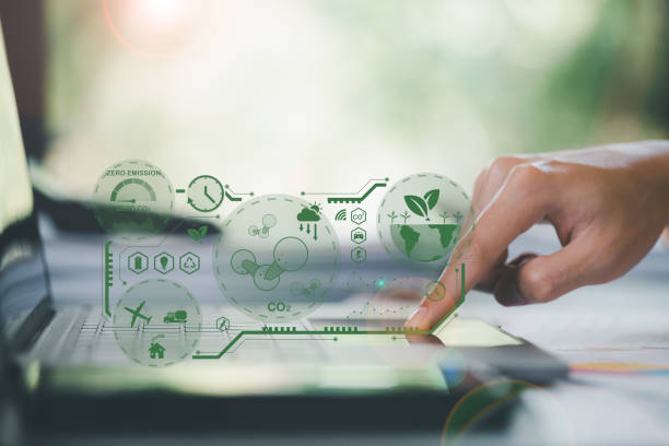 istock Industrial emissions pollute the environment and ecology.including climate change,Carbon Reduction Agreement from Renewable Energy Reduce greenhouse gas emissions,Conservationist working on laptop 1457515004