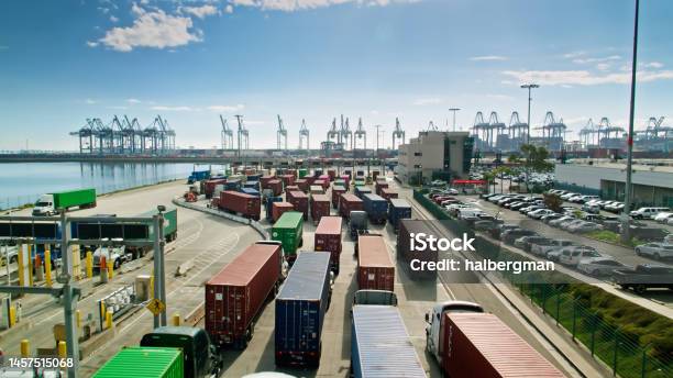 Drone Shot Of Trucks At Terminal Entrance In Port Of Los Angeles Stock Photo - Download Image Now