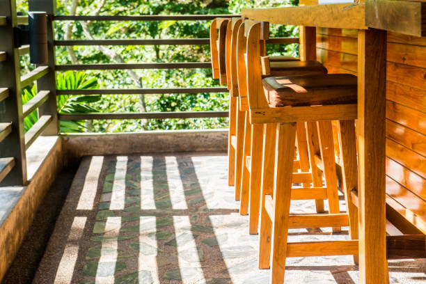 istock Modern wooden chairs in the park 1457521506