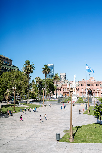 Plaza de Mayo in Buenos Aries. Central square in Buenos Aires with the Argentinean flag in the summer next to the presidential palace. Attractions, travel and tourism in Argentina. High quality photo