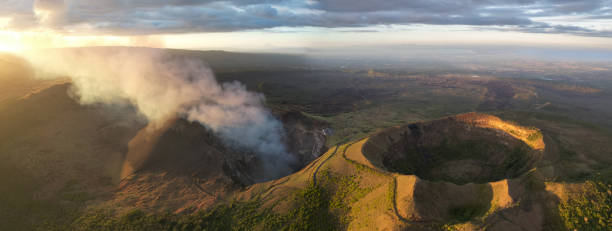 Santiago volcano crater in Masaya Nicaragua Santiago volcano crater in Masaya Nicaragua aerial drone view on sunset time masaya volcano stock pictures, royalty-free photos & images