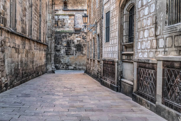 empty deserted carrer de la pietat street in the gothic quarter of barcelona, spain - gotic imagens e fotografias de stock