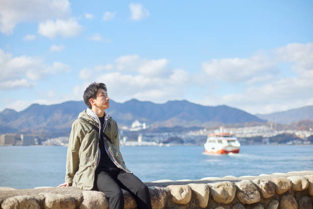 Japanese young man enjoy traveling alone