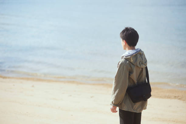 Japanese young man enjoy traveling alone