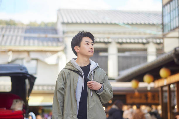 istock Japanese young man enjoy traveling alone 1457536828