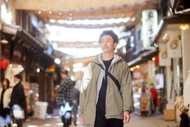 istock Japanese young man enjoy traveling alone 1457536829