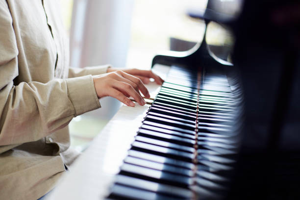 Young Japanese women playing the piano