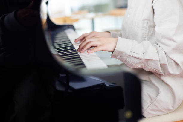 Young Japanese women playing the piano