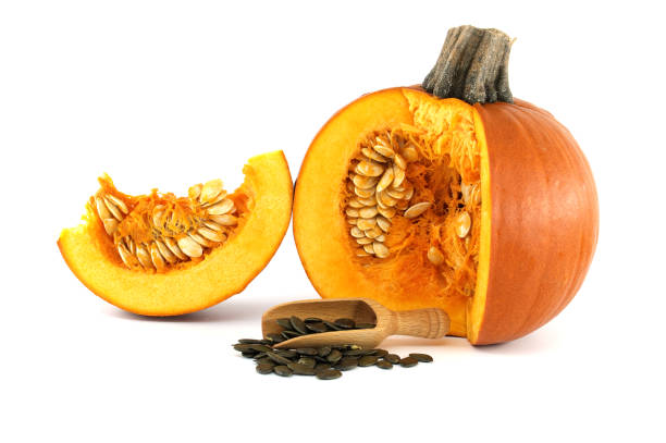 istock Dried hulled pumpkin seeds and fresh pumpkin 1457545760