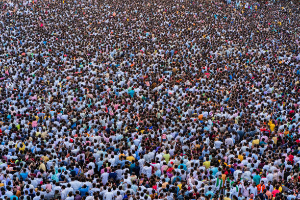 Sea of crowd On the occasion of an annual festival at Koppal, a district located in Northern part of Karnataka in India, people gathered in huge numbers to celebrate the occasion. india crowd stock pictures, royalty-free photos & images