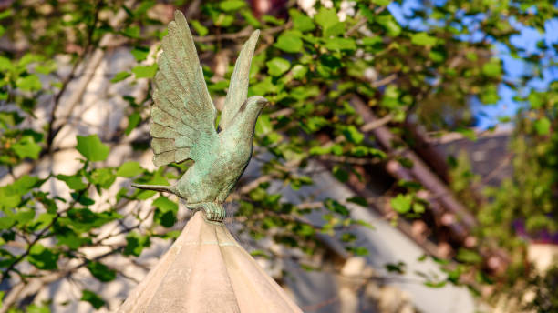 Eagle Gate Monument bronze eagle sculpture at the intersection of State Street and South Temple in Salt Lake City, Utah.