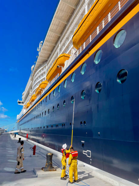 Workers Clean Disney Wish Cruise Ship Windows, Nassau, The Bahamas stock photo