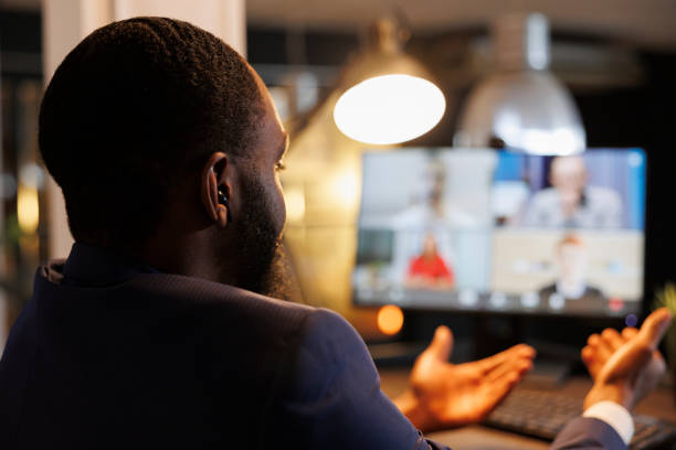 istock Corporate manager explaining investment plan to remote team 1457569153