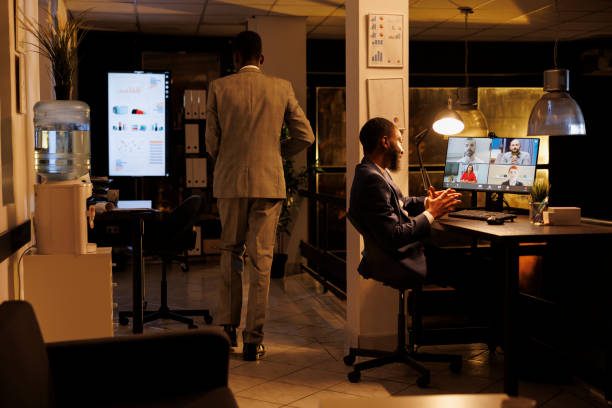 istock Entrepreneur having remote discussion with company team 1457570487