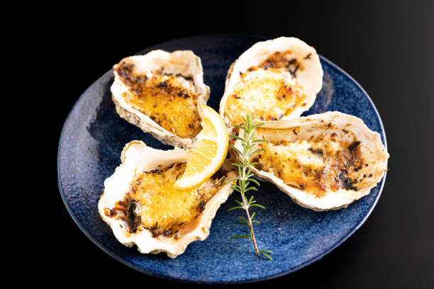 istock Fresh oysters that can be eaten raw by a Japanese chef cooked into a gratin 1457571808