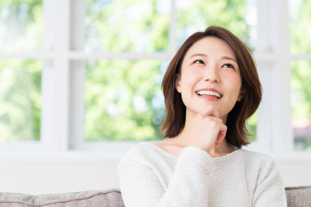 istock attractive asian woman relaxing 1457574226