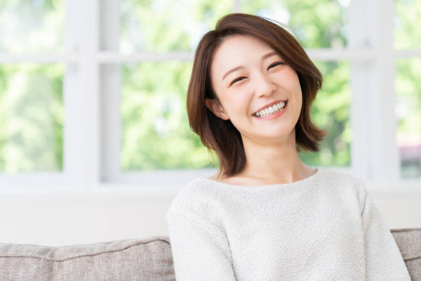 istock attractive asian woman relaxing 1457574246