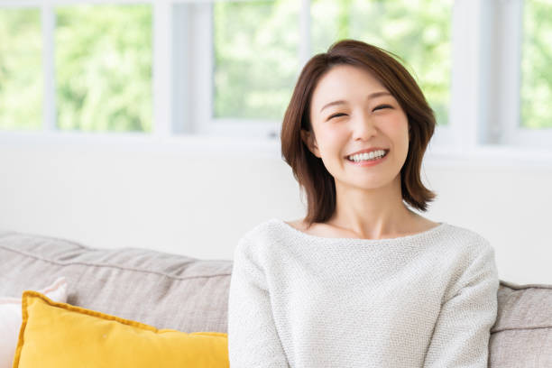 istock attractive asian woman relaxing 1457574273