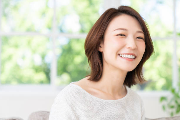 istock attractive asian woman relaxing 1457574340