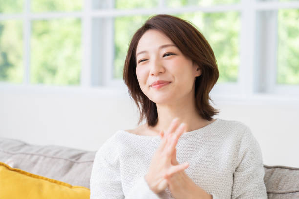 istock attractive asian woman relaxing 1457574366